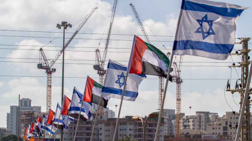 Israeli and United Arab Emirates flags on the side of a road in the city of Netanya, Aug. 16, 2020. Photo by Flash90.