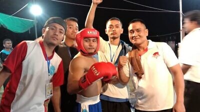 Obed Hrangchal, 26, of India (center) has already won two gold, seven silver and two bronze national medals in Wushu (Chinese Kungfu), kickboxing, Muay Thai (“Thai boxing”) and karate. Credit: Courtesy of Shavei Israel.