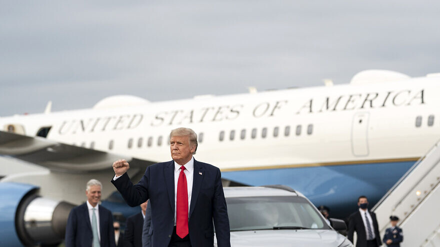 U.S. President Donald Trump gives a fist pump after disembarking Air Force One on Sept. 8, 2020, at the Piedmont Triad International Airport in Greensboro, N.C. Credit: Joyce N. Boghosian/The White House.