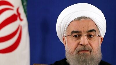 Iranian President Hassan Rouhani holding a press conference after his victory in the 2017 presidential election. Credit: Mahmoud Hosseini/Wikimedia Commons.