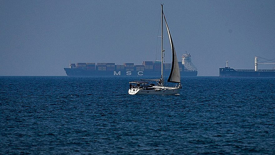 A cargo ship is seen off the coast of the northern Israeli city of Haifa on June 9, 2019. Photo by Meir Vaknin/Flash90