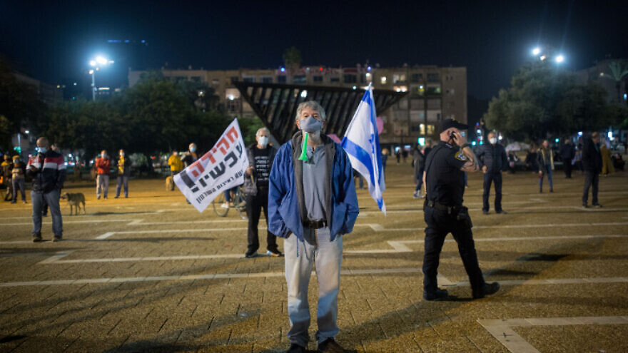 Israelis protest against Israeli Prime Minister Benjamin Netanyahu at Rabin Square in Tel Aviv on Nov. 28, 2020. Photo by Miriam Alster/Flash90.