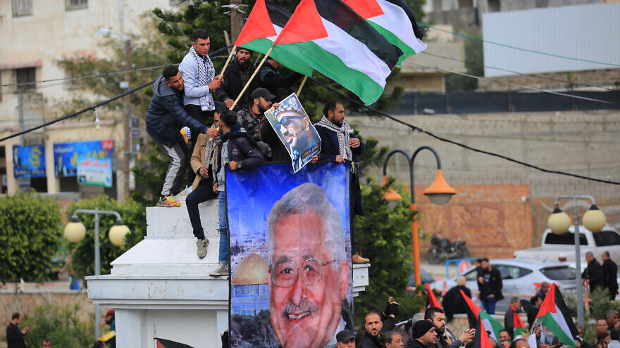 Palestinians take part in a rally in Gaza City in support of Palestinian Authority head Mahmoud Abbas and against U.S. President Donald Trump's Middle East peace plan, on Feb. 11, 2020. Photo by Ail Ahmed/Flash90.