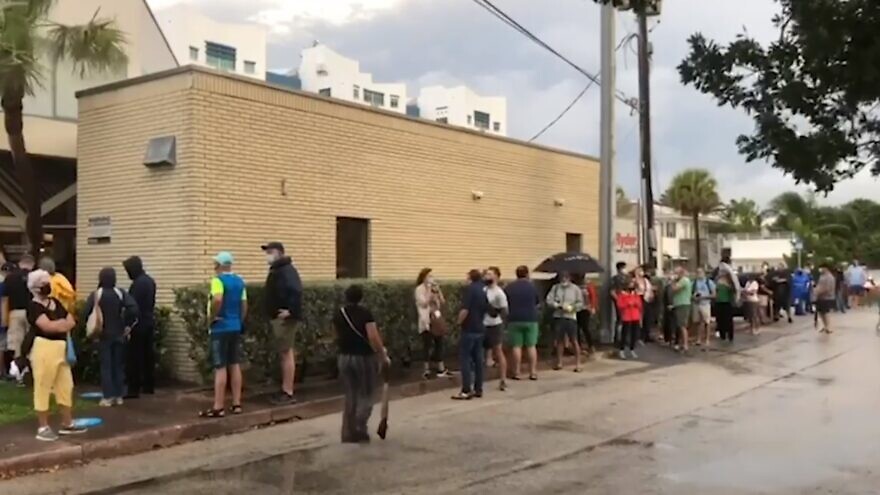 Voters line up at a polling place in Florida. Source: Screenshot.