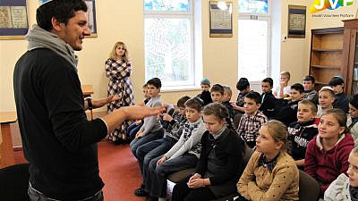 Prior to the coronavirus pandemic, Artem Okun leads a Jewish educational seminar for young Jews in Kharkiv, Ukraine. Credit: JDC.