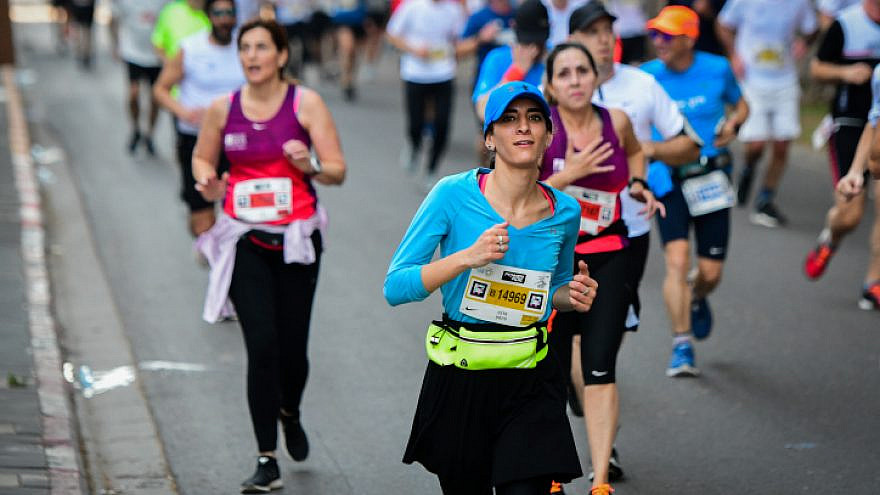 Runners take part in the Tel Aviv marathon pre-global pandemic on Feb. 28, 2020. Photo by Avshalom Sassoni/Flash90.