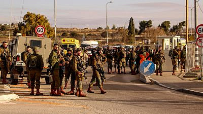 Israeli security personnel near the scene of an attempted stabbing attack at the Gush Etzion Junction, Jan. 31, 2021. Photo by Gershon Elinson/Flash90.