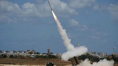 An Iron Dome air-defense battery set near the southern Israeli city of Ashdod fires an intercepting missile on July 14, 2014. Photo by David Buimovitch/Flash90.