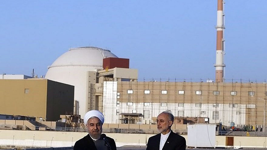 Iranian President Hassan Rouhani (left) and head of the Atomic Energy Organization of Iran (AEOI) Ali Akbar Salehi near the Bushehr nuclear plant, Jan. 13, 2015. Credit: Hossein Heidarpour/Wikimedia Commons.