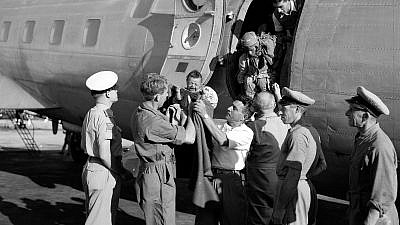 Yemenite immigrants being greeted by Jewish Agency representatives at Israel's Lod Airport in 1949. Credit: National Photo Collection/Government Press Office.