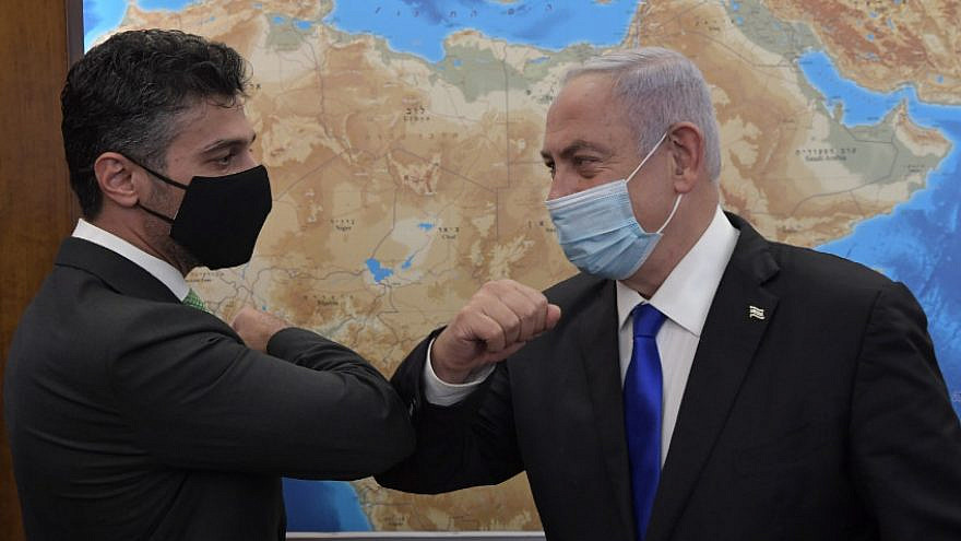 Mohammed Fateh Ali Al Khaja (left), the United Arab Emirates' first ambassador to Israel, meets Israeli Prime Minister Benjamin Netanyahu in Jerusalem on March 2, 2021. Credit: Koby Gideon/GPO.