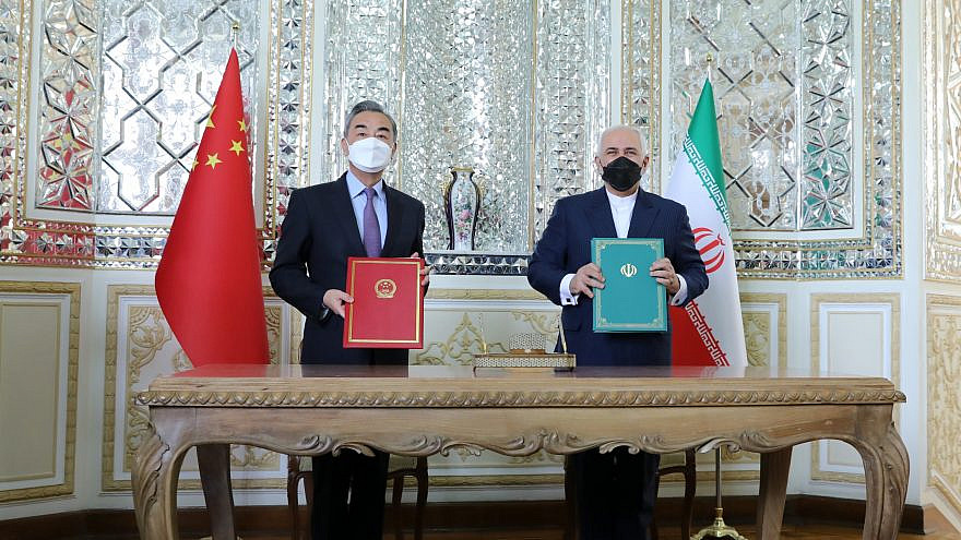 Chinese Foreign Minister Wang Yi and Iranian Foreign Minister Javad Zarif following the signing of a 25-year strategic cooperation agreement. Source: Javad Zarif/Twitter.
