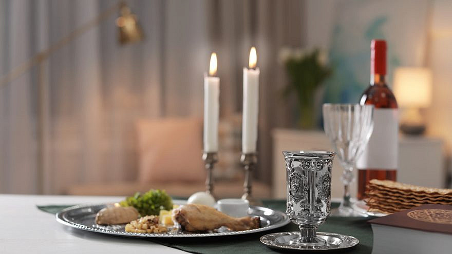 A Passover table setting. Credit: New Africa/Shutterstock.