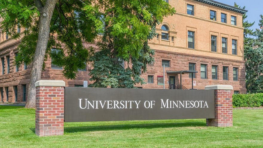 Entrance sign and Wulling Hall on the campus of the University of Minnesota. Credit: Ken Wolter/Shutterstock.