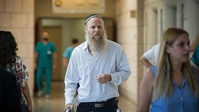 Rabbi Eitan Shnerb at the Hadassah Ein Kerem Hospital in Jerusalem. Rabbi Shnerb was wounded in a terrorist bombing near Dolev that killed his daughter Rina. Aug. 28, 2019. Photo by Yonatan Sindel/Flash90.