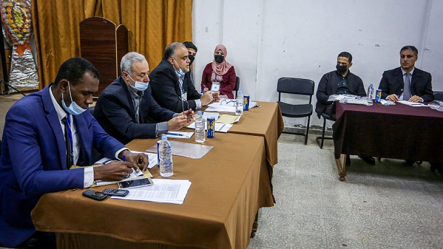 Members of the Palestinian Elections Committee hold a meeting with representatives of the factions and parties running in the upcoming Palestinian elections, in Rafah, in the southern Gaza Strip, on March 18, 2021. Photo by Abed Rahim Khatib/Flash90.