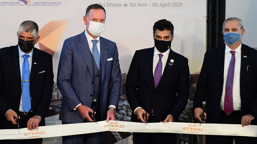 UAE Ambassador to Israel Mohamed Al Khaja (second from right) and Etihad Airways CEO Tony Douglas (second from left) at a ceremony marking the arrival of the first commercial passenger flight from Abu Dhabi to Israel at Ben-Gurion International Airport on April 6, 2021. Photo by Tomer Neuberg/Flash90.