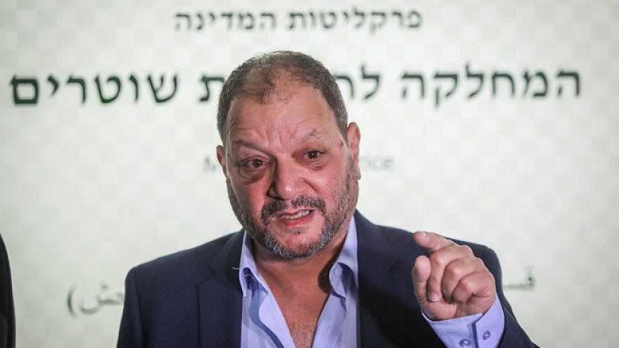 Joint Arab List Knesset member Ofer Cassif arrives at the Israel Police's Internal Investigations Department in Jerusalem, to file a complaint against officers who allegedly attacked him during a protest, April 11, 2021. Photo by Noam Revkin Fenton/Flash90.