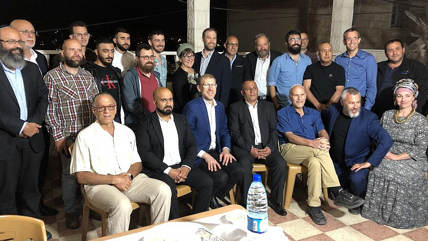 Guests at an Iftar gathering attended by Jews and Arabs, and hosted by Palestinian businessman Ashraf Jabari in Hebron, April 2021. Photo by Josh Hasten.