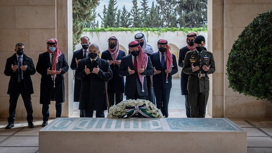 The Jordanian Royal Family visits the Royal Hashemite Cemetery to mark the kingdom’s centennial and in remembrance of former kings. Closest to the wreath are King Abdullah; his uncle, Prince Hassan; and his son, Crown Prince Hussein bin Abdullah II (in uniform). In the back row are other princes, including former Crown Prince Hamza bin Hussein, April 11, 2021. Credit: Jordanian King's Office.