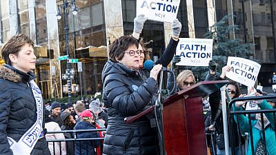 Nancy Kaufman, former CEO of the National Council of Jewish Women, speaks at women's march in New York at Central Park West in 2018. Credit: Lev Radin/Shutterstock.