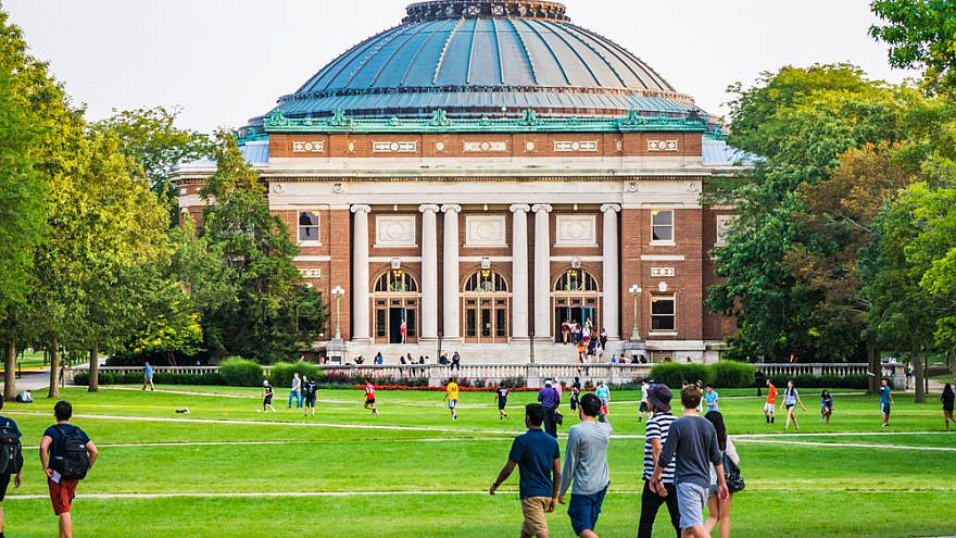 Students walk on the Quad at the University of Illinois-Urbana campus in 2016. Credit: Leigh Trail/Shutterstock.