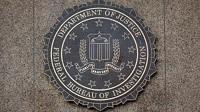 The FBI seal located outside the J. Edgar Hoover FBI Building in downtown Washington, D.C., on Dec. 26, 2014. Credit: Mark Van Scyoc/Shutterstock.
