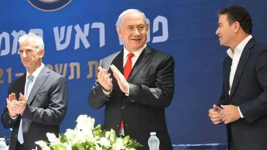 Incoming Mossad head David Barnea (left), Israeli Prime Minister Benjamin Netanyahu and outgoing Mossad chief Yossi Cohen. Credit: GPO.