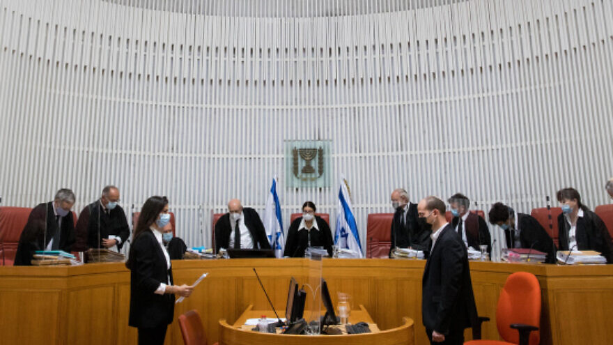 Israeli Supreme Court President Esther Hayut and Supreme Court justices arrive to petitions against the Jewish Nation-State Law, at the Supreme Court in Jerusalem, Dec. 22, 2020. Photo by Yonatan Sindel/Flash90.