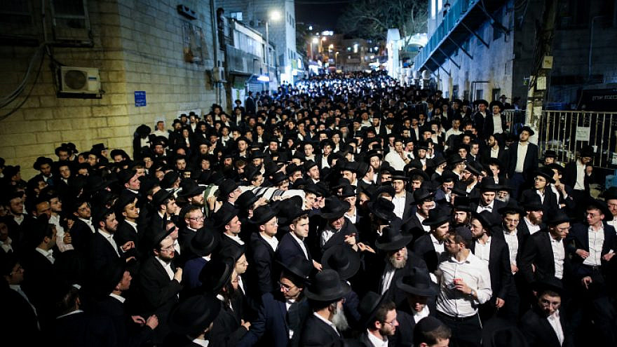 Haredi Jews attend the funeral of Yousef Kahn, one of the victims of the Meron tragedy, where 45 people were crushed to death on April 30 outside the Mir Yeshiva in Jerusalem, May 2, 2021. Photo by Noam Revkin Fenton/Flash90.