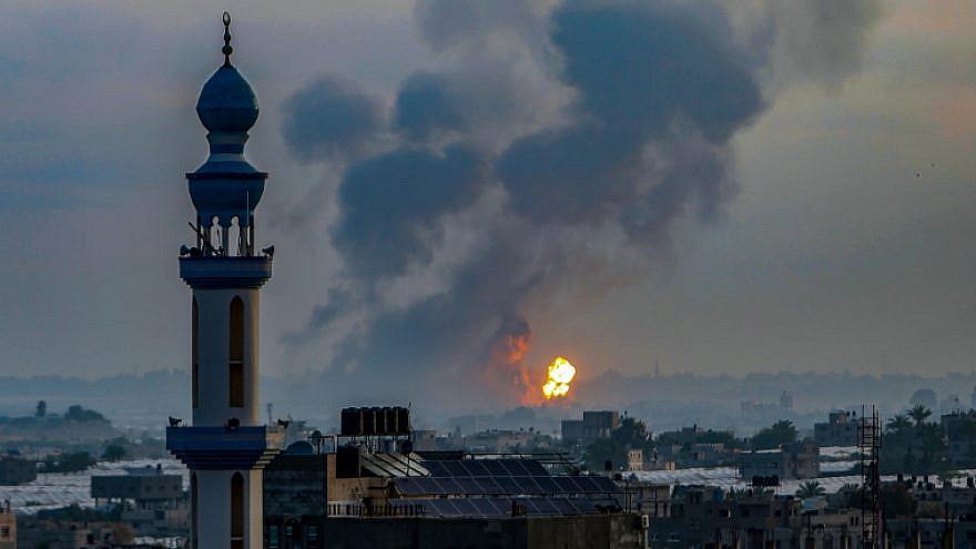 Smoke and flames rise after an Israeli airstrike on a site of the Izz al-Din al-Qassam Brigades, the armed wing of Hamas, west of Khan Yunis in the southern Gaza Strip, May 11, 2021. Photo by Abed Rahim Khatib/Flash90.