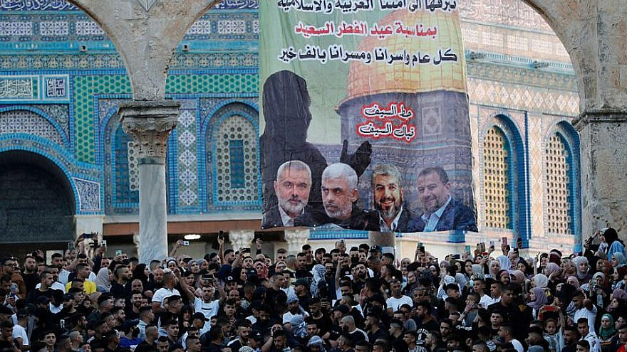 A pro-Hamas poster featuring the heads the terror organization, in front of the Dome of the Rock in Jerusalem, on May 13, 2021. Credit: Israel Hayom.
