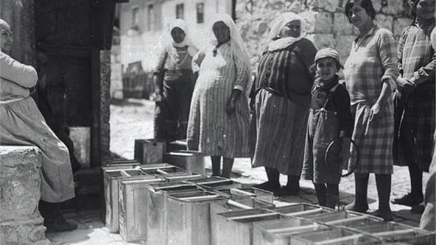 Water distributed to Jerusalemites from locally manufactured containers made of aluminum to prevent rusting, 1931. Credit: Yaacov Ben Dov/KKL-JNF archives.