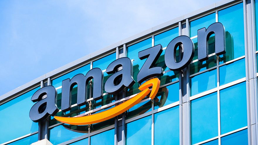 Amazon logo on the facade of one of its corporate office buildings in Silicon Valley, in the San Francisco Bay area. Credit: Sundry Photography/Shutterstock.