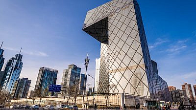 CCTV Headquarters famous skyscraper in the Central Business District of Beijing. Credit: Fotokon/Shutterstock.