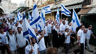 Thousands of Jews wave Israeli flags during a Jerusalem Day march, May 20, 2012. Photo by Yonatan Sindel/Flash90.