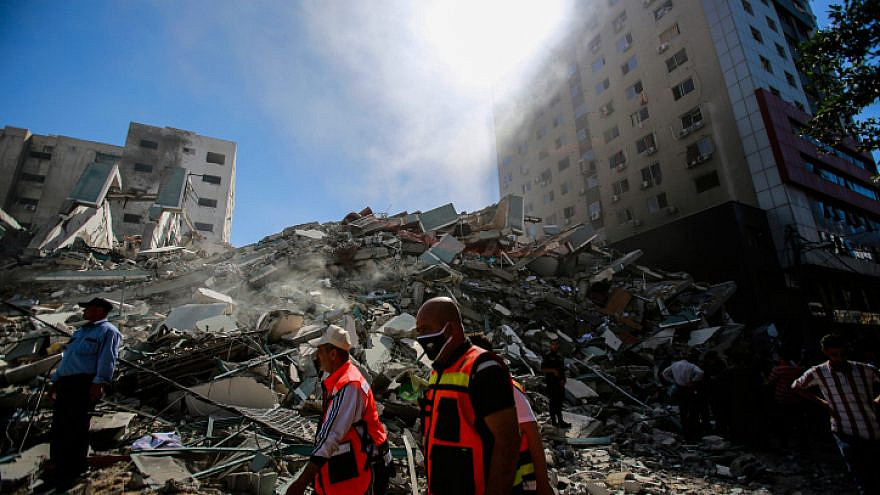 The aftermath of an Israeli airstrike on Gaza's Al-Jalaa tower in Gaza City, which according to the Israeli military housed Hamas intelligence, May 15, 2021. The building also housed several media outlets, including the Associated Press and Al Jazeera. Photo by Atia Mohammed/Flash90.