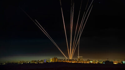 A long-exposure picture showing Israel's Iron Dome anti-missile system firing interceptors at rockets fired from the Gaza Strip, as seen from Ashdod, May 15, 2021. Photo by Avi Roccah/Flash90.