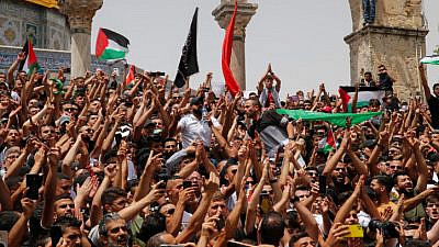 Palestinians protest at the Al-Aqsa mosque compound in Jerusalem's Old City, May 21, 2021. Photo by Jamal Awad/Flash90.