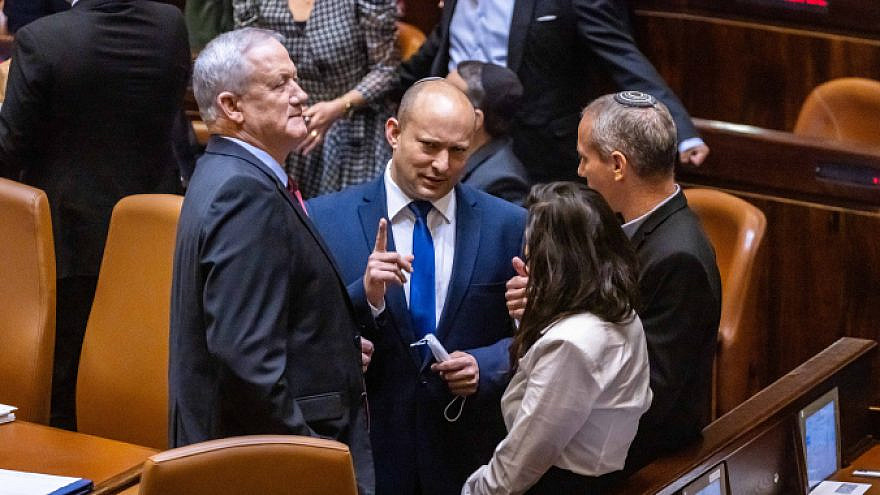 Yamina Party head Naftali Bennett (center), Blue and White Party leader Benny Gantz (left), Yamina MK Ayelet Shaked (bottom right) and Blue and White MK Hilik Tropper in the plenum hall of the Israeli parliament during the voting in the presidential elections, in Jerusalem, June 2, 2021. Photo by Olivier Fitoussi/Flash90.