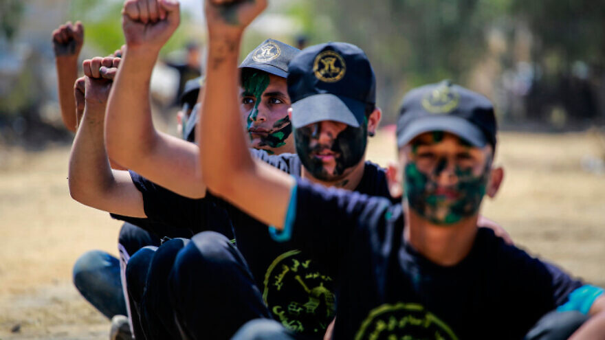Young Palestinians take part in a military-style exercise at a summer camp organized by Palestinian Islamic Jihad in the Gaza Strip, on June 26, 2021. Photo by Atia Mohammed/Flash90.