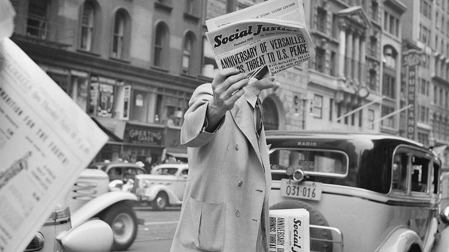 “Social Justice,” founded by Father Charles Coughlin, sold on important street corners and intersections in New York City. Credit: 	Dorothea Lange/Library of Congress, Prints & Photographs Division, via Wikimedia Commons.
