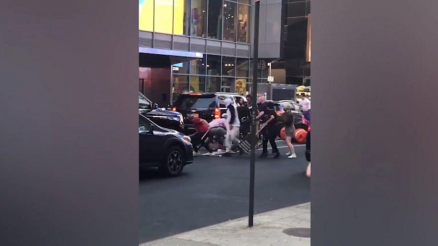The on-camera anti-Semitic assault of Joseph Borgen in Times Square, N.Y., in late May. Source: Screenshot.