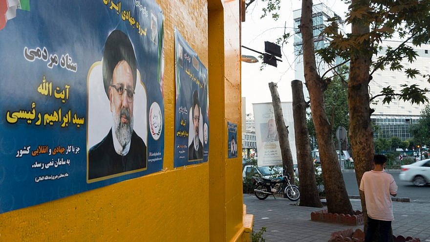 A poster of Ebrahim Raisi, one of the leading candidates in Iran's presidential elections, June 2021. Credit: Farzad Frames/Shutterstock.