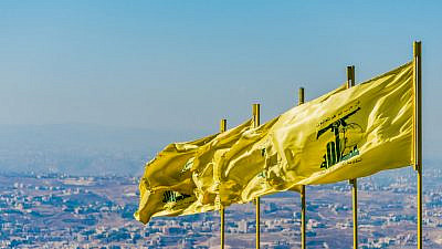 Hezbollah flags flying over southern Lebanon. Credit: John Grummitt/Shutterstock.