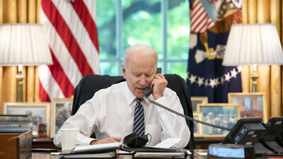 U.S. President Joe Biden speaks on the phone with Israeli Prime Minister Benjamin Netanyahu on May 12, 2021, in the Oval Office of the White House. Credit: Official White House Photo by Adam Schultz.