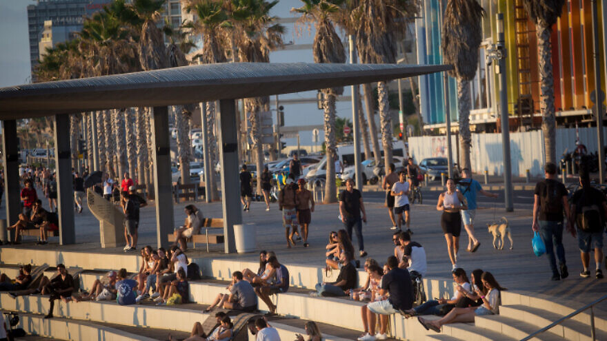 Israelis enjoy the beach in Tel Aviv, July 06, 2021. Photo by Miriam Alster/Flash90.