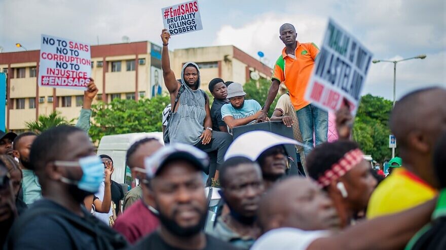 Protesters against police brutality in Lagos, Nigeria, Oct. 13, 2020. Credit: Kaizenify via Wikimedia Commons.