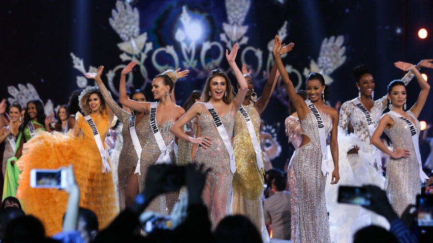 Miss Universe contestants on stage during the Miss Universe 2018 preliminary round. Credit: Shutterstock.