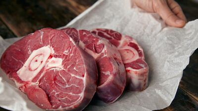 Close-up of three kosher steaks. Credit: BublikHaus/Shutterstock.